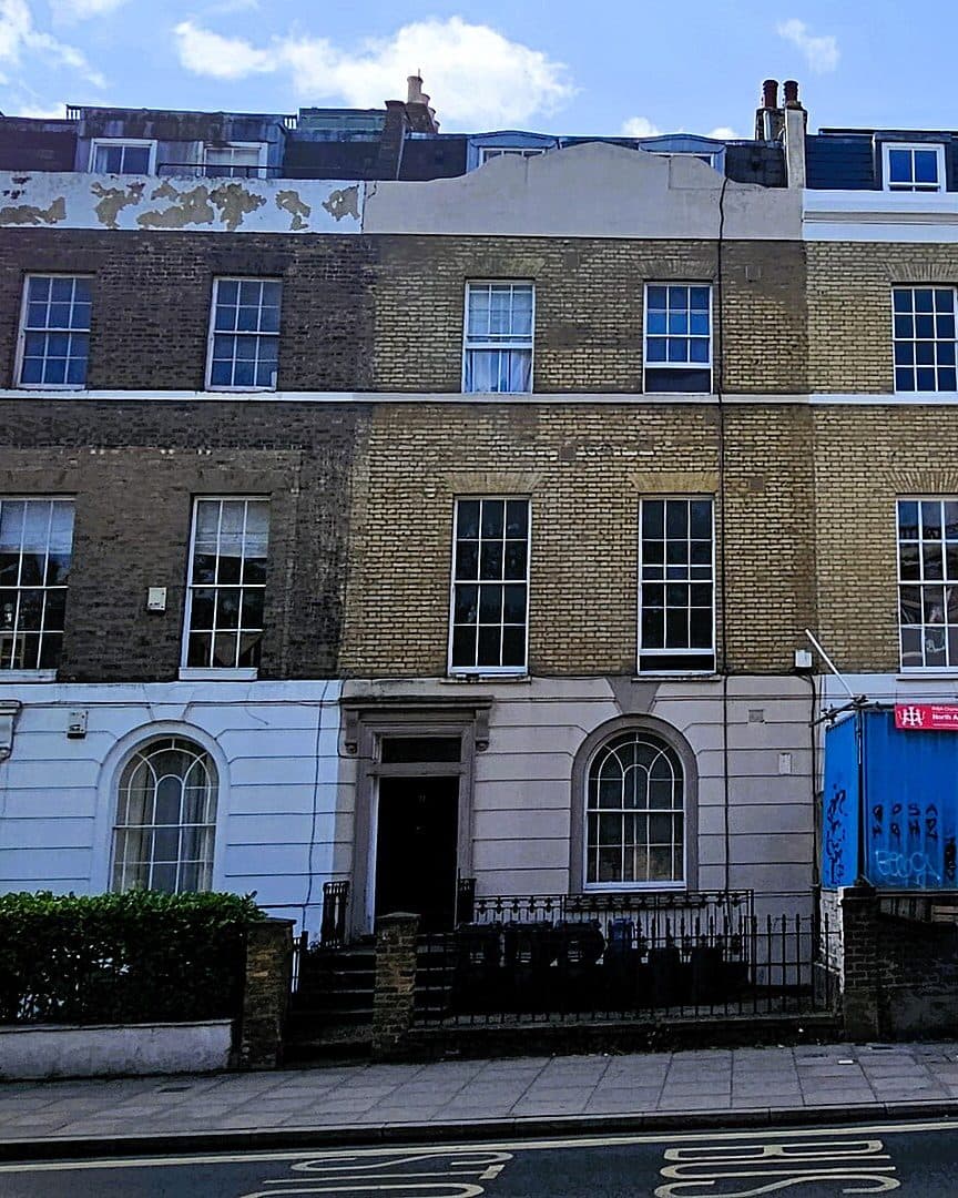 A brick terrace with flats above shopfronts on Stoke Newington Church Street